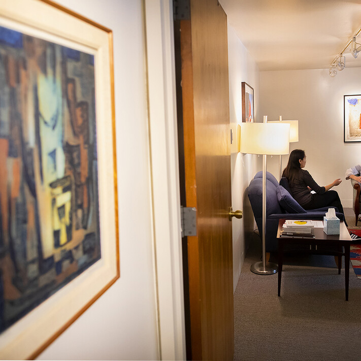 person having consultation in a private office