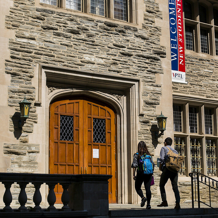 students approaching Houston Hall entrance